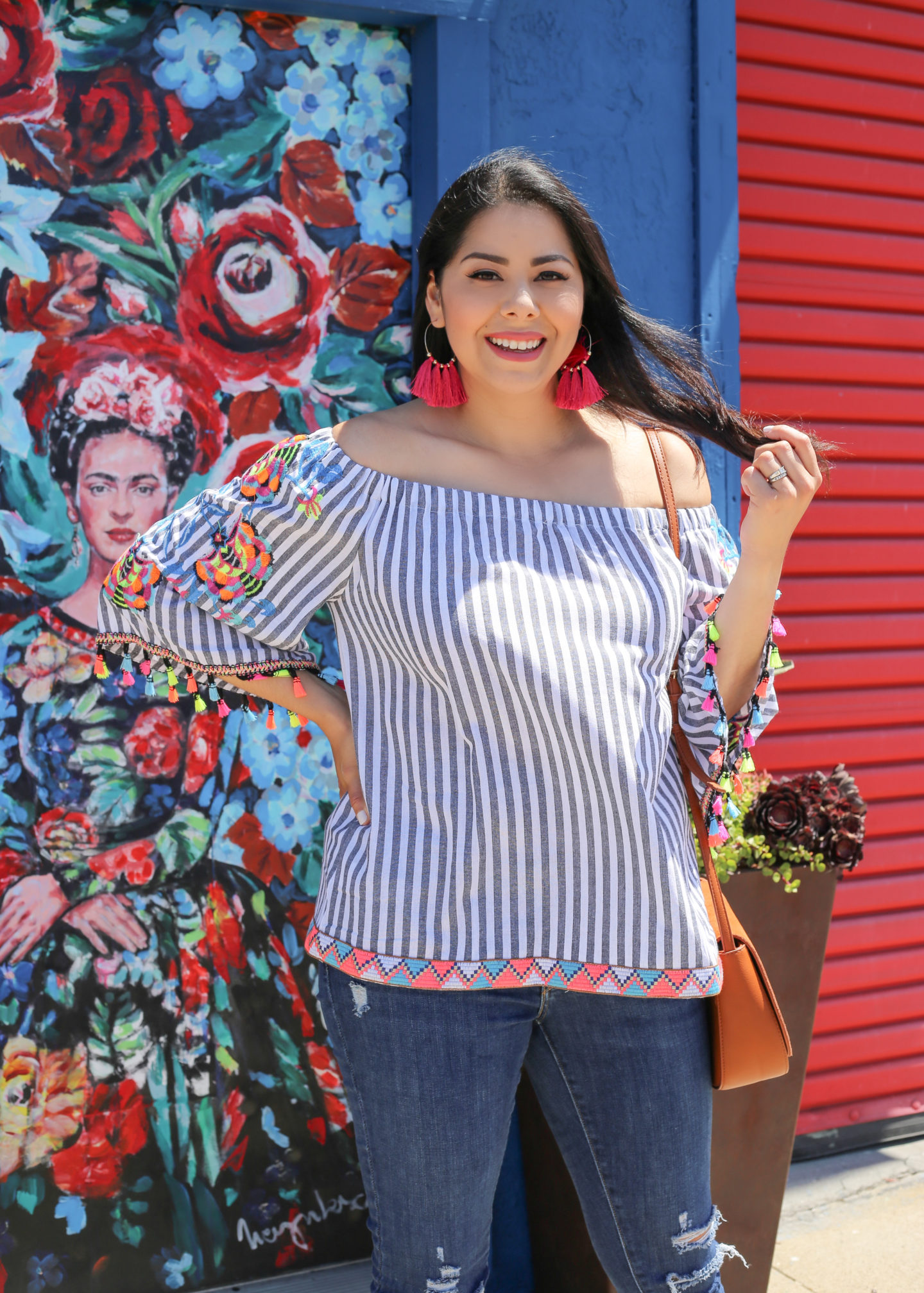 Latina Fashion Blogger wearing tassel earrings