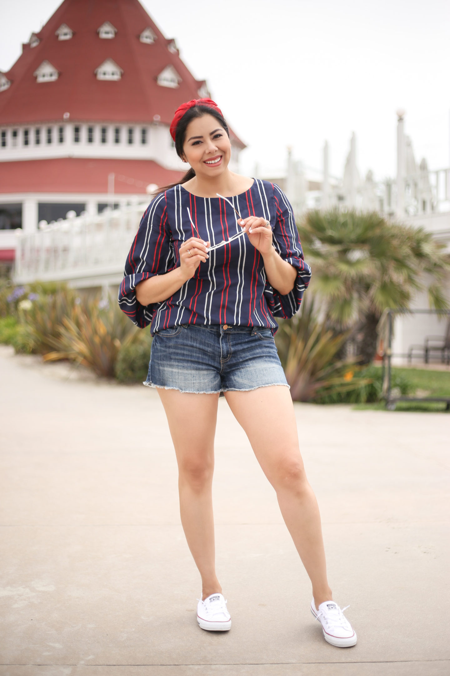 fourth of july outfit idea featuring distressed jeans and striped top