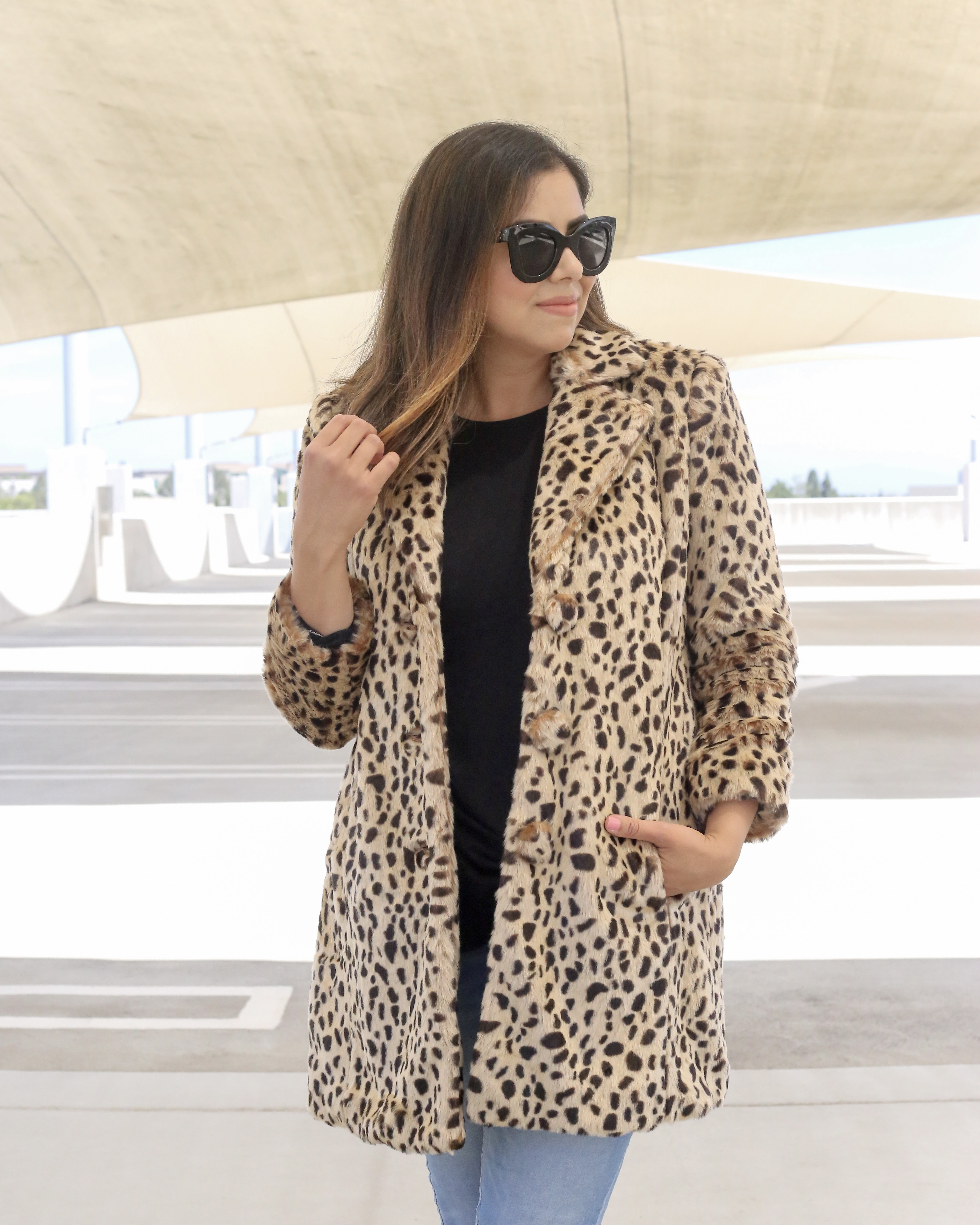 Black oversized sunnies, faux fur leopard coat