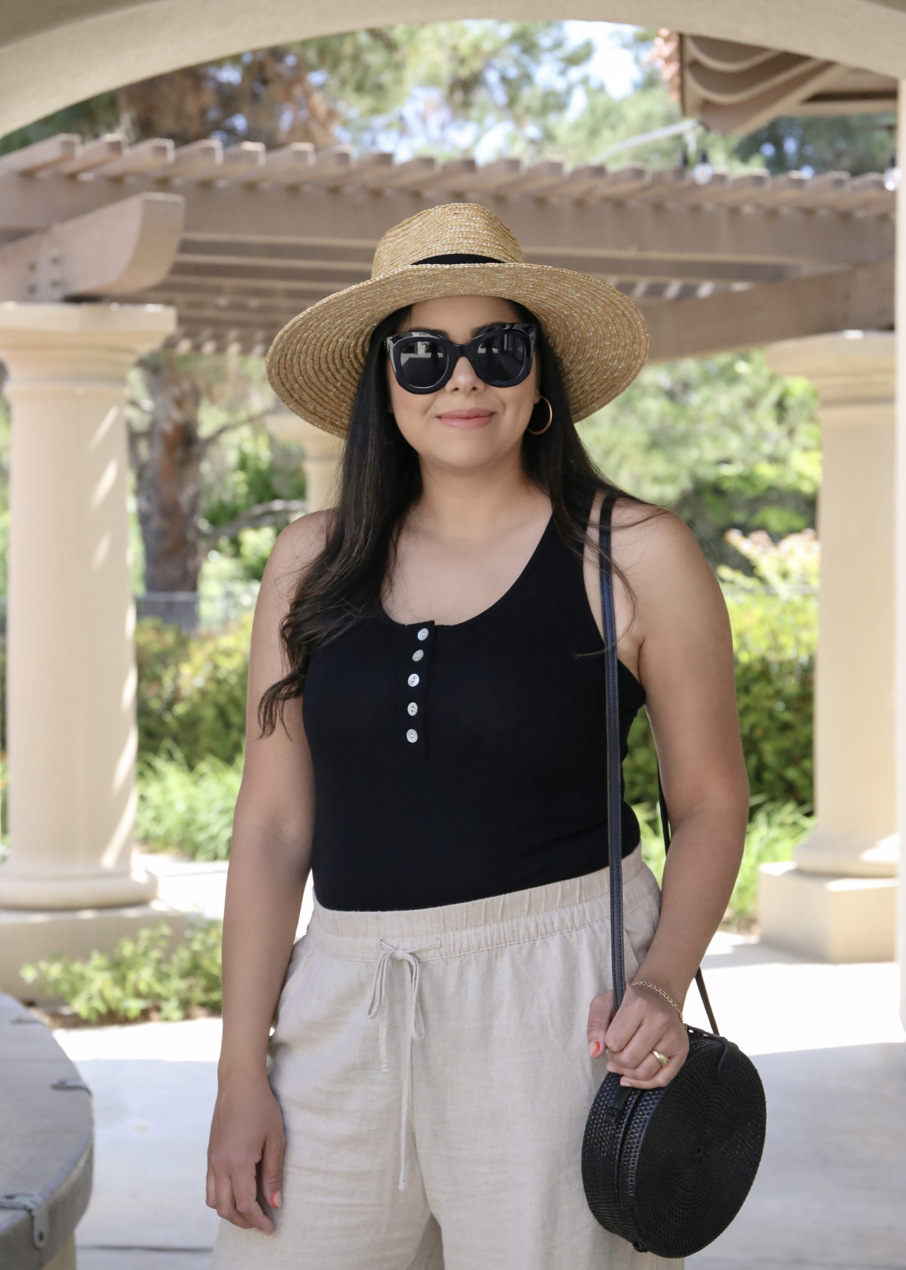 Tan wide leg pants outfit, black Amazon fashion bodysuit, how to style with Brixton Joanna hat