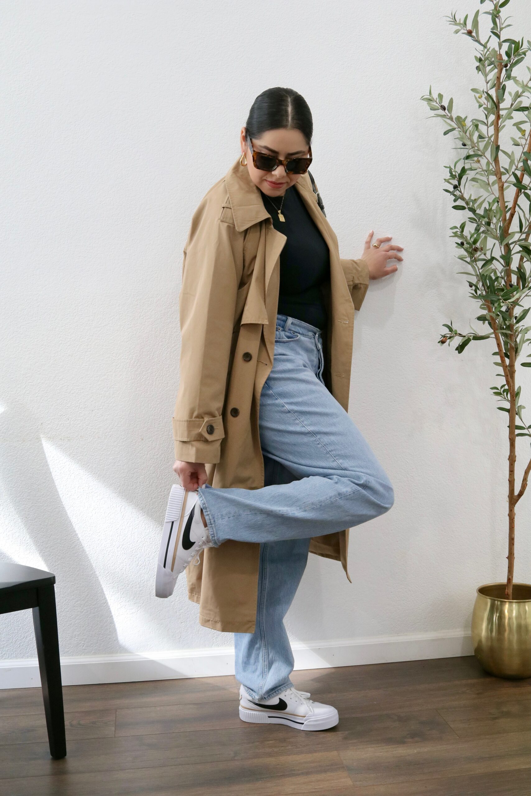 casual spring outfit with sneakers, how to style a trench coat for spring, how to wear sneakers in a chic way